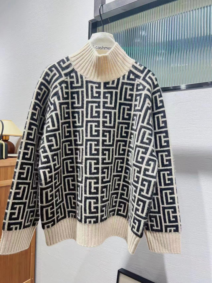 Kaschmir-Rollkragenpullover mit schwarzem und weißem Jacquardmuster